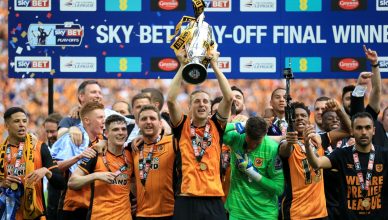Hull City's Michael Dawson lifts the trophy after winning the Championship Play-Off Final at Wembley Stadium, London. PRESS ASSOCIATION Photo. Picture date: Saturday May 28, 2016. See PA story SOCCER Championship. Photo credit should read: Nigel French/PA Wire. RESTRICTIONS: EDITORIAL USE ONLY No use with unauthorised audio, video, data, fixture lists, club/league logos or "live" services. Online in-match use limited to 75 images, no video emulation. No use in betting, games or single club/league/player publications.