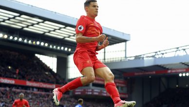 Liverpool's Philippe Coutinho celebrates scoring his side's second goal, during the English Premier League soccer match between Liverpool and Everton, at Anfield, in Liverpool, England